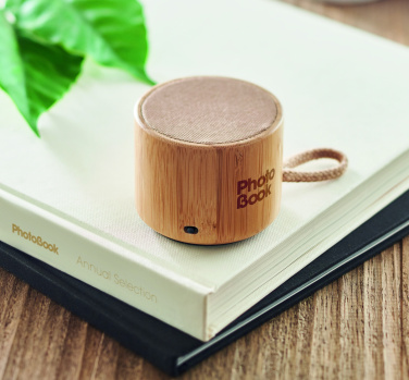 Logo trade corporate gifts picture of: Round bamboo wireless speaker