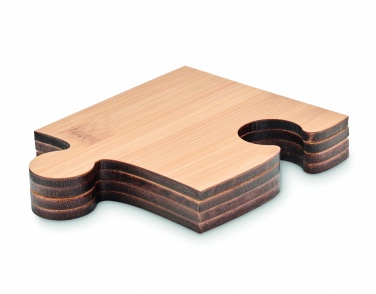 Logotrade meened pilt: Puzzle kujuliste tassialuste komplekt